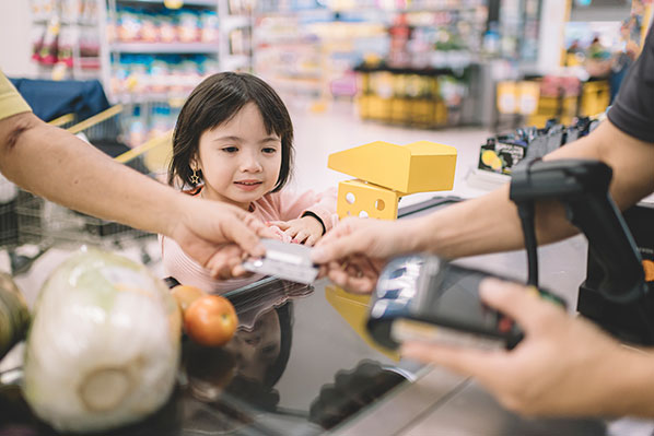 girl at checkout stand