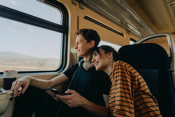 A couple riding on a bus