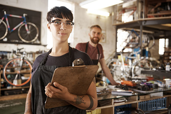 business owner holding a clipboard.jpg