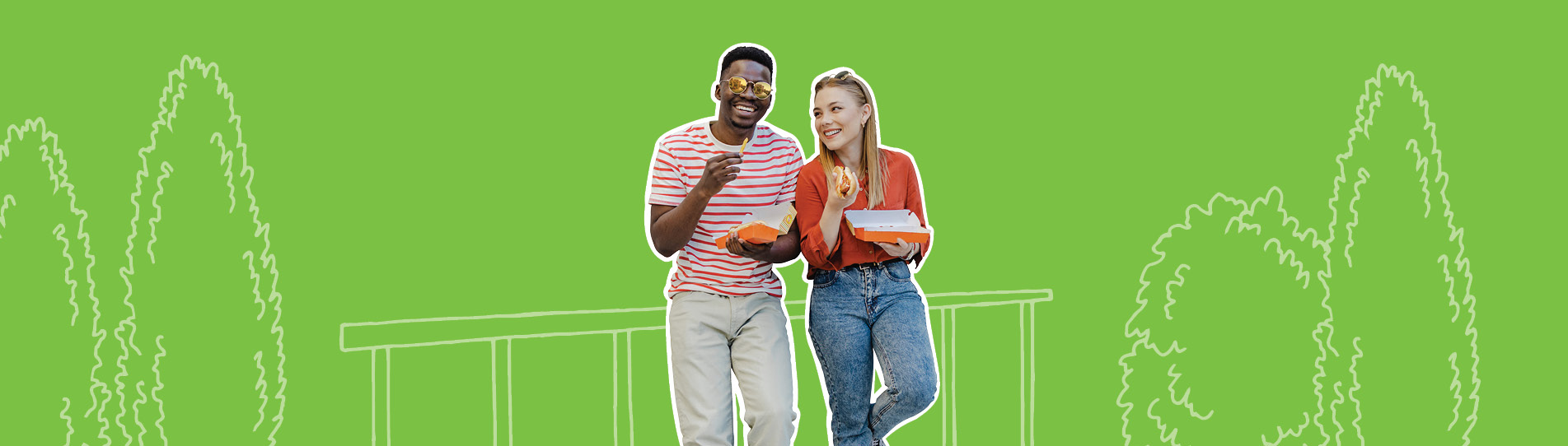 two young friends having takeout leaning on a railing outside