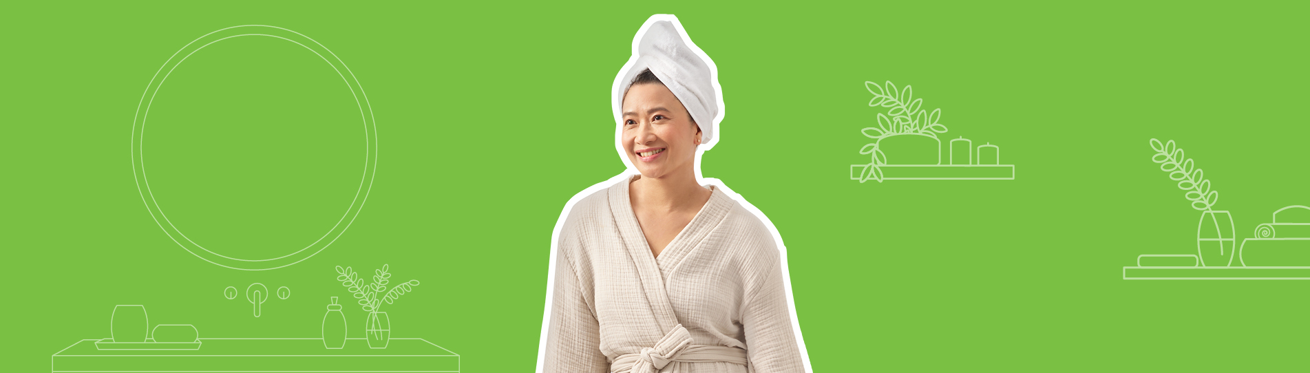 middle-aged Asian woman smiling leaning on her bathtub in her nice new bathroom