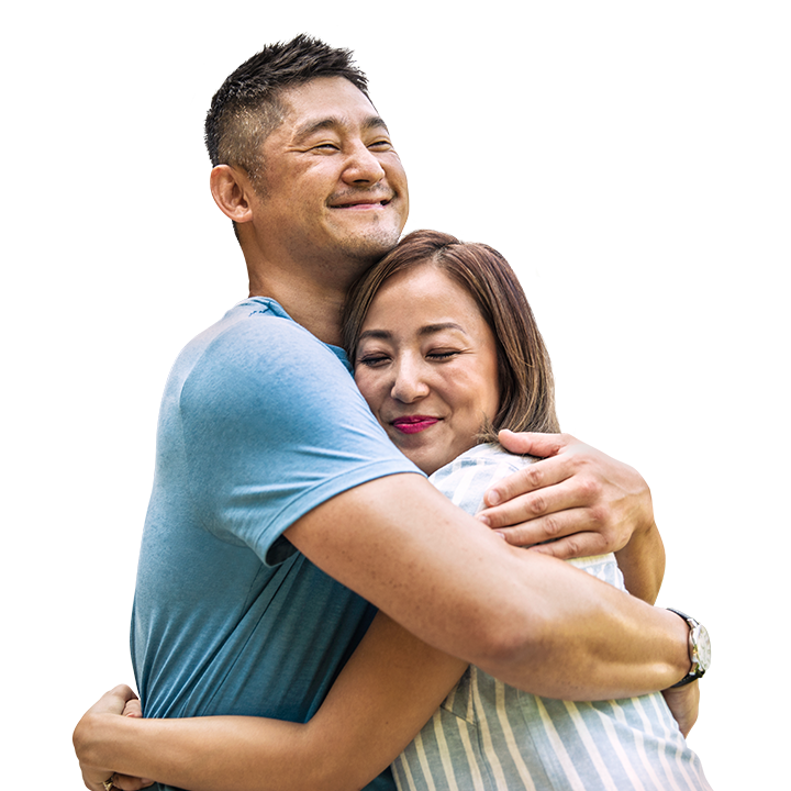 middle-aged asian couple hugging