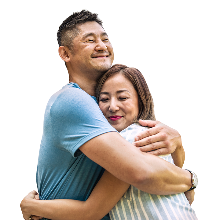 middle-aged asian couple hugging