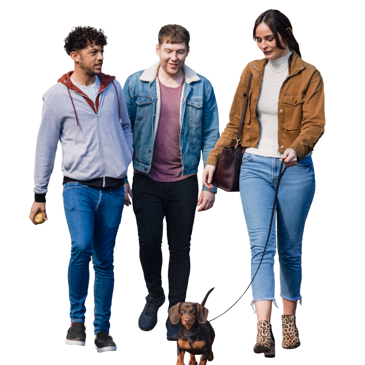 Three friends on a walk with a dog