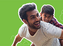 son on dad's shoulders