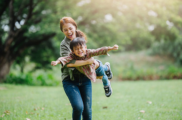 mother playing with son