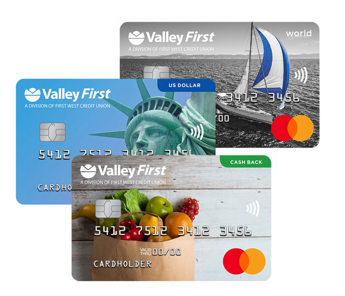 a stack of 3 personal Valley First credit cards